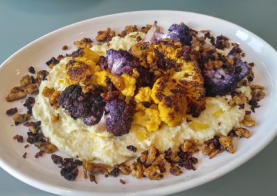 Roasted cauliflower with parsnip puree and walnut salsa