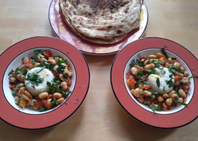 Cannellini beans, tomato broth, poached eggs